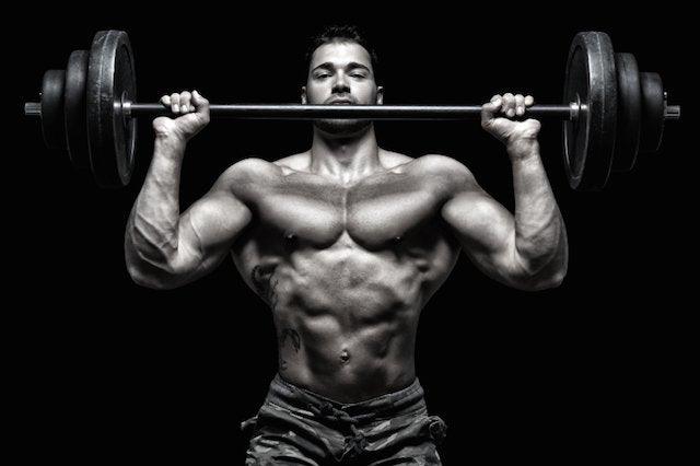 Standing vs Seated Military Press: Which Is a Better Shoulder Exercise. - Infinte Labs