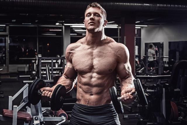 men doing dumbell curls, infinite_labs