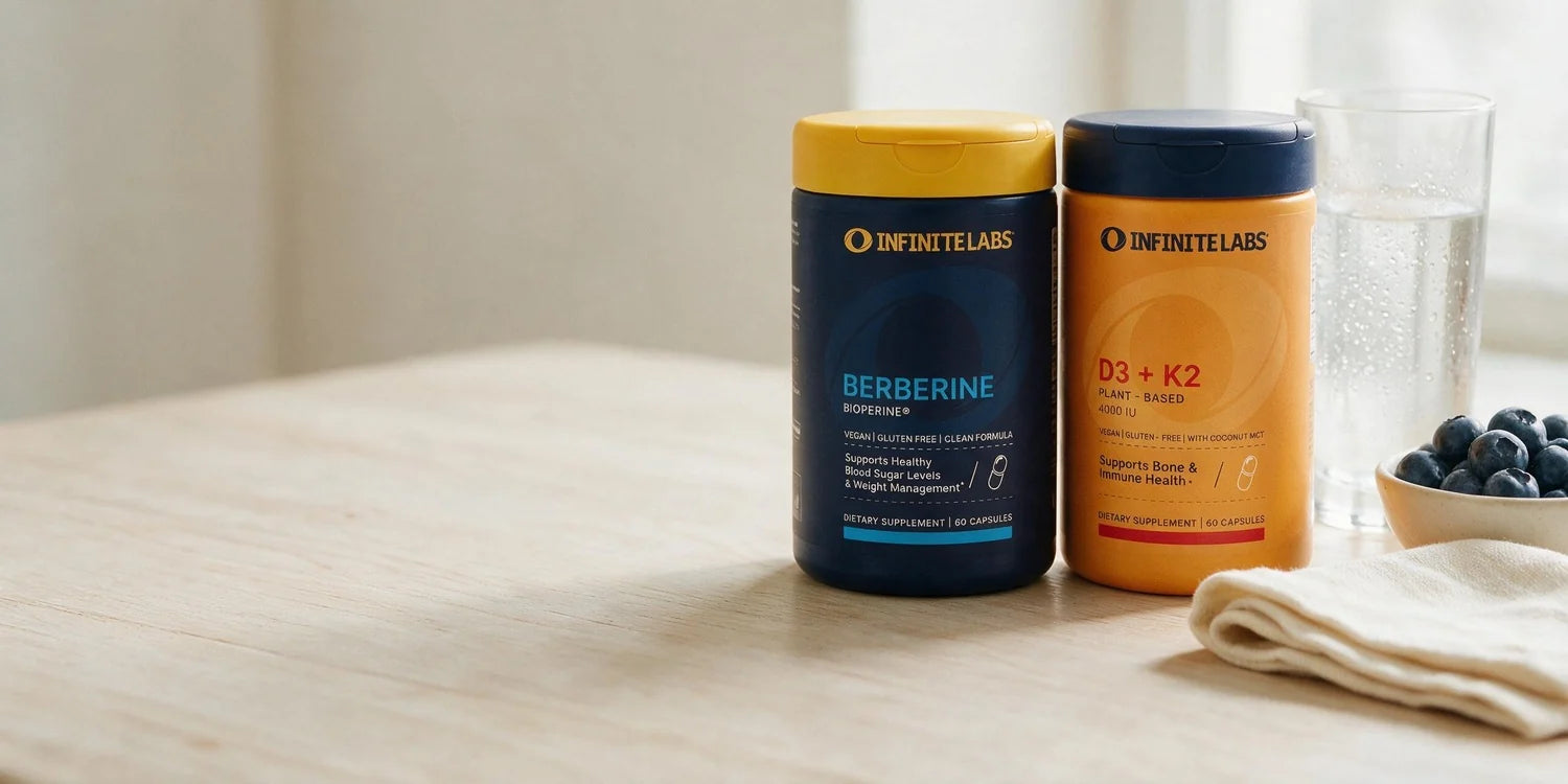 Berberine and D3 + K2 bottles in natural window light
